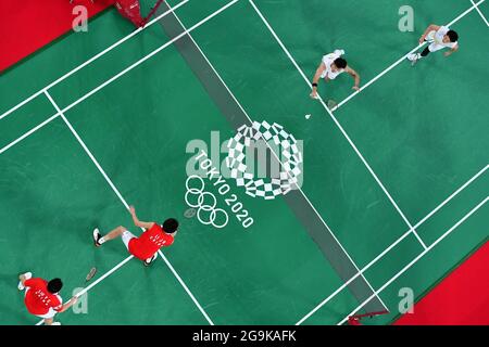 Tokyo, Japan. 27th July, 2021. Li Junhui/Liu Yuchen of China compete with Kamura Takeshi/Sonoda Keigo of Japan during the men's doubles badminton group match at the Tokyo 2020 Olympic Games in Tokyo, Japan, July 27, 2021. Credit: Li Yibo/Xinhua/Alamy Live News Stock Photo