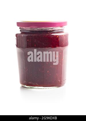 Jar of raspberry jam isolated on white background. Stock Photo