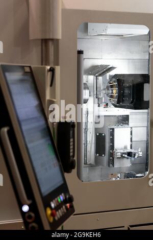 High precision turn-mill CNC machining center. Selective focus. Stock Photo