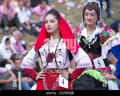 Lepushe, Albania - August 11, 2012: parade of some competitors to "Miss Mountain 2012" (Albanian: Miss Bjeshka 2012) with traditional Albanian dress a Stock Photo