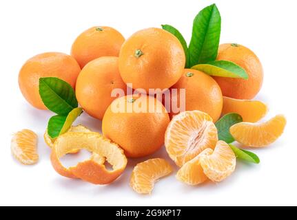 Ripe orange tangerine fruits and green citrus leaves isolated on white background. Stock Photo