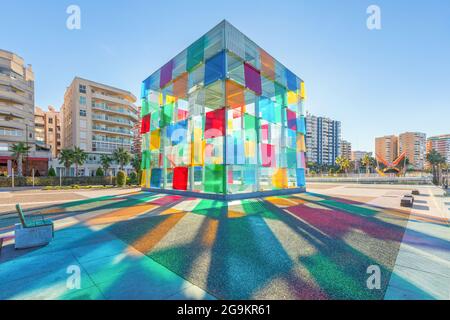 Malaga, Spain - December 15 2016: Colorful glass cube which is entrance to Centre Pompidou, located in renovated port area of Malaga Stock Photo