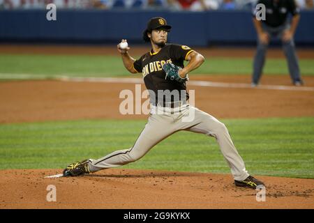 San Diego Padres pitcher Yu Darvish (11) pitches the ball during an MLB regular season game against the Miami Marlins, Sunday, July 25, 2021, in Miami Stock Photo