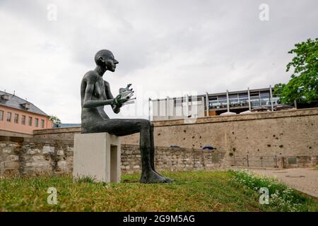 July 2021, Erfurt Germany, Man with an animal, a new sculpture in Erfurt Stock Photo