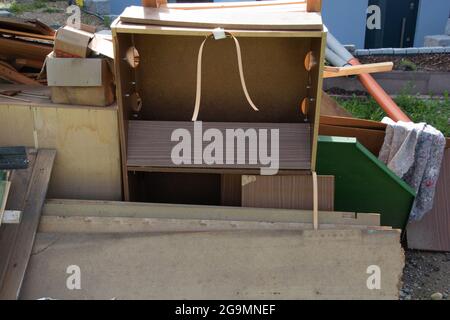 destroyed furniture after flood triggered by heavy rain in bavaria in july Stock Photo