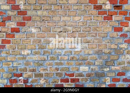 Wall made of old bricks as a background Stock Photo