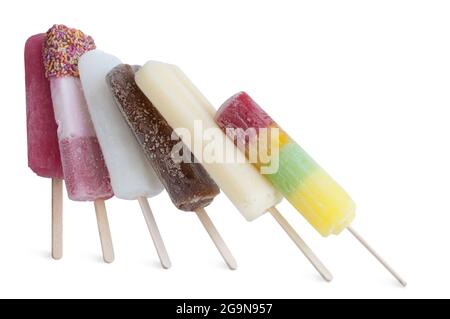 Frozen assorted ice lollies on a white background Stock Photo