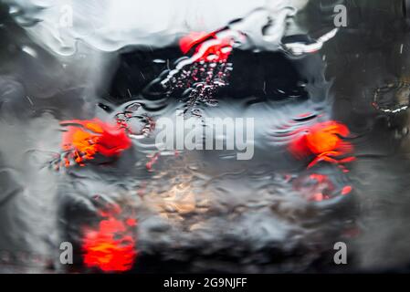 water drops on the car window on a rainy day in the city of Salvador, Bahia. Stock Photo