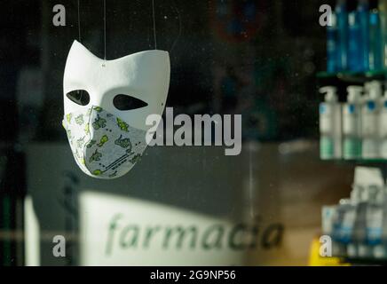 Coruna / Spain - March 20 2021: Covid-19 mask display in a drug store shop window in Spain Stock Photo