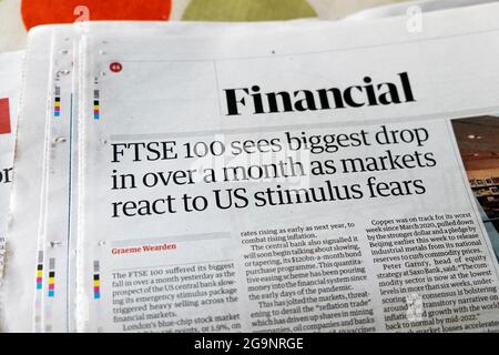 Financial section Guardian newspaper headline 'FTSE 100 sees biggest drop in over a month as markets react to US stimulus fears'  18 June 2021 London Stock Photo