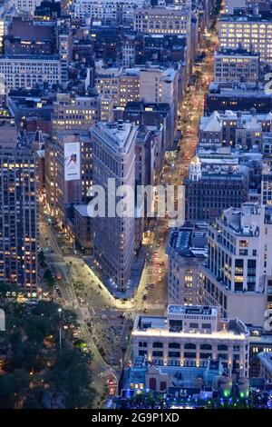 Sunset view of rooftops of the Flatiron District with water towers and ...