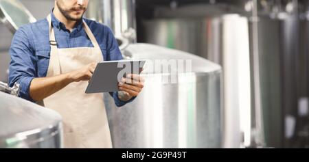 Modern technology for managing large factory, work in brewery Stock Photo