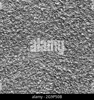 Seamless texture of crumpled aluminum leaf foil, close-up. Stock Photo