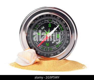 sea shells and old compass with sand isolated on white background Stock Photo