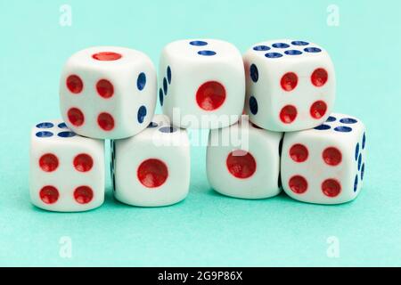 Gaming dices on blue background. Game concept. Stock Photo
