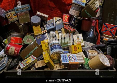 Collection of WW2 British boxes and cans with cigarettes, tobacco and matches distributed to allied soldiers during World War Two Stock Photo