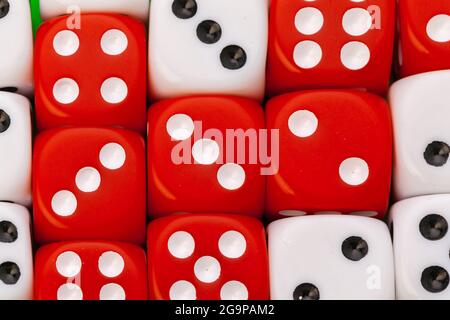 Rolling dice on a wooden desk Stock Photo