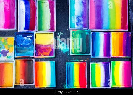 Set of multi-colored professional paints for drawing on the face, close-up Stock Photo