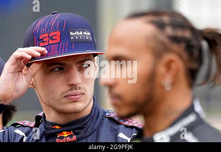 File photo dated 15-07-2021 of Red Bull Racing's Max Verstappen with Mercedes driver Lewis Hamilton. Issue date: Tuesday July 27, 2021 . Stock Photo
