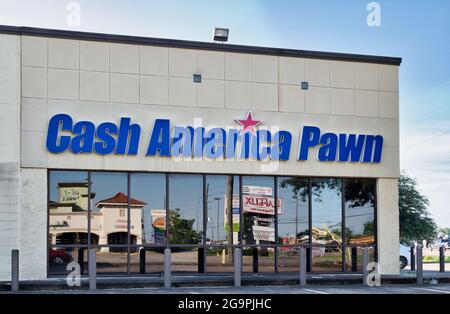 Houston, Texas USA 06-03-2021: Cash America Pawn building exterior in Houston, TX. Retail chain with headquarters in Fort Worth, Texas est. 1984. Stock Photo