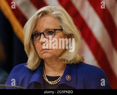 Washington, United States. 27th July, 2021. U.S. Representative Liz Cheney (R-WY) listens during the opening hearing of the U.S. House (Select) Committee investigating the January 6 attack on the U.S. Capitol at the Canon House Office Building in Washington, DC on Tuesday, on July 27, 2021. About 140 police officers were injured when they were trampled by the former President Donald Trump supporters aiming to overthrow the 2020 presidential election. Five people died. Pool Photo by Jim Bourg/UPI Credit: UPI/Alamy Live News Stock Photo