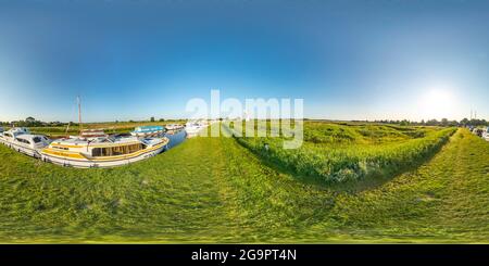 360 degree panoramic view of Thurne, Norfolk, UK – July 2021. Full spherical seamless panorama 360 degree angle view of Thurne Dyke on a sunny, Norfolk Broads