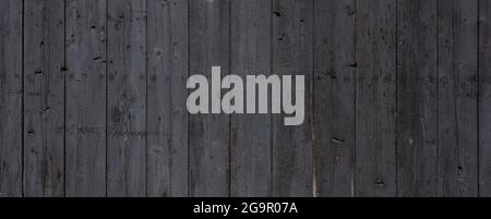 black background of vertical wooden old grungy painted planks Stock Photo