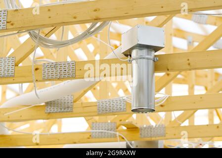 installation of ventilation in a new timber frame house under construction Stock Photo