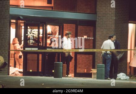 Killeen Texas USA, October 16,1991: Police investigators work at the crime scene of a mass shooting at Luby's Cafeteria in Killeen. George Hennard, a 35-year-old Killeen resident, crashed a pickup into the eatery and shot 23 people to death before killing himself. ©Bob Daemmrich Stock Photo