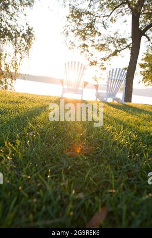 Adirondack Chairs Beside Lake Winnipesaukee, New Hampshire, USA Stock Photo