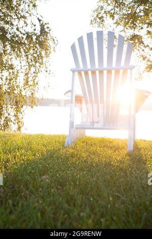 Adirondack Chairs Beside Lake Winnipesaukee, New Hampshire, USA Stock Photo