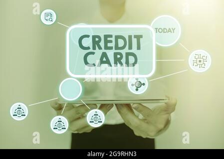 Hand writing sign Credit Card. Business idea an electronic and plastic paying method for purchasing goods Lady In Uniform Standing Holding Tablet Stock Photo