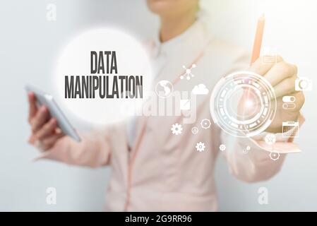 Text sign showing Data Manipulation. Business concept the process of changing data to make it easier to read Business Woman Touching Digital Data On Stock Photo