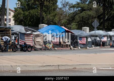 Los Angeles, CA USA - Julyl 3, 2021: Row of tents for homeless veterans surrounding the permieter of the Veterans Administration  and Hospital grounds Stock Photo