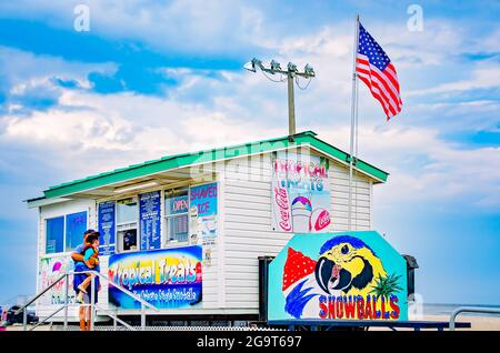 Customers wait in line at Tropical Treats snow cone stand, July 24, 2021, in Long Beach, Mississippi. Stock Photo