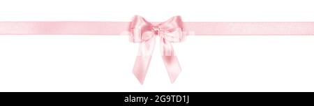 Beautiful pink ribbon with bow isolated on white background. Stock Photo