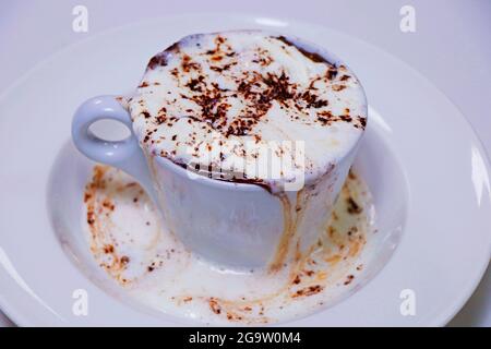 baked chocolate cappuccino dessert with whipped cream and dark chocolate Stock Photo