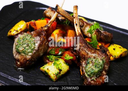 grilled prime lamb rack with herb butter and ratatouille Stock Photo