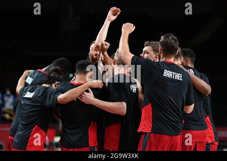 Saitama, Japan. 28th July, 2021. Basketball: Olympics, Nigeria - Germany, Preliminary Round, Group B, Matchday 2 at Saitama Super Arena. The German players cheer. Credit: Swen Pförtner/dpa/Alamy Live News Stock Photo