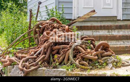 a pile of large rusting chains Stock Photo