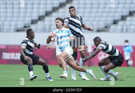 Tokyo, Japan. 28th July, 2021. Ignacio Mendy (front, C) of Argentina competes during Rugby Seven Men's semifinal match between Fiji and Argentina at the Tokyo 2020 Olympic Games in Tokyo, Japan, on July 28, 2021. Credit: Xue Yubin/Xinhua/Alamy Live News Stock Photo