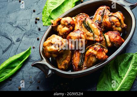 Chicken wings fried in teriyaki sauce.Appetizing chicken meat Stock Photo