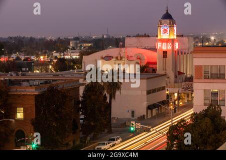 Bakersfield, California, USA - December 01, 2020: Twilight view of traffic passing through downtown Bakersfield. Stock Photo