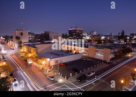 Bakersfield, California, USA - December 01, 2020: Twilight view of traffic passing through downtown Bakersfield. Stock Photo