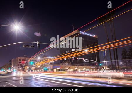 Bakersfield, California, USA - December 01, 2020: Twilight view of traffic passing through downtown Bakersfield. Stock Photo