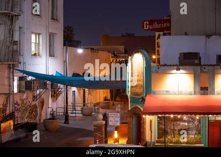 Bakersfield, California, USA - December 01, 2020: Nighttime view of the downtown Wall Street Alley. Stock Photo