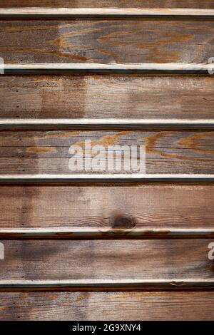 Old rustic brown wooden plank background. Seamless texture. Vintage brown wood pattern. Stock Photo