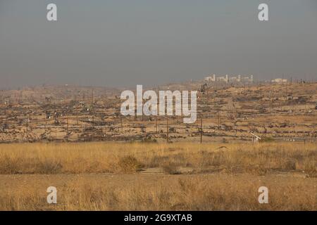 Daytime view of crude oil extraction in Bakersfield, California, USA. Stock Photo