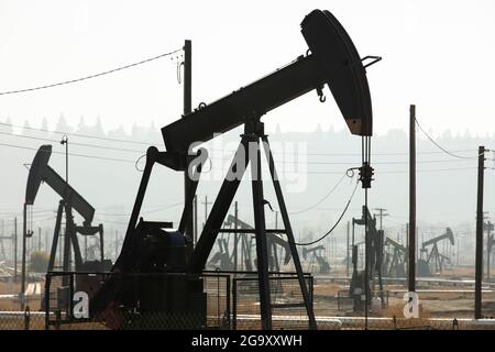 Daytime view of crude oil extraction in Bakersfield, California, USA. Stock Photo