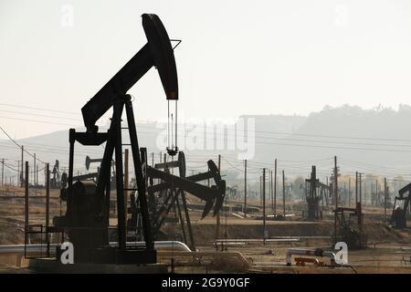 Extraction Of Crude Oil In Oilfield. Oil Drilling Rig Pumps Oil ...